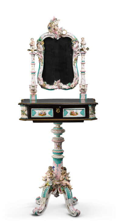 View full screen - View 1 of Lot 110. A German porcelain and ebonised wood dressing table, late 19th century.