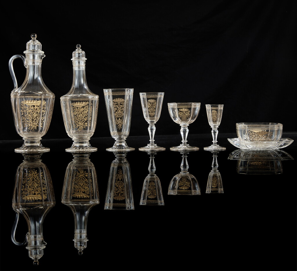 View full screen - View 1 of Lot 563. A fine Continental engraved and gilt glass part service, mid-19th century.