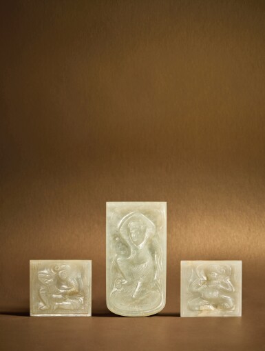 View full screen - View 1 of Lot 122. Three pale green jade 'musicians and dancer' belt plaques, Tang dynasty .