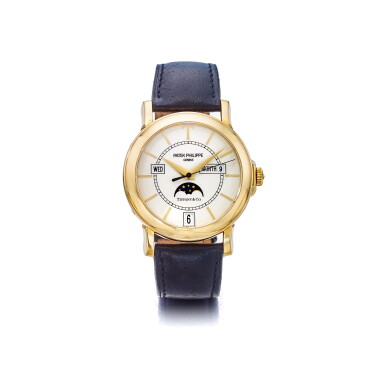 View full screen - View 1 of Lot 995. PATEK PHILIPPE | REF 5150 T-150 RETAILED BY TIFFANY & CO.: A LIMITED EDITION YELLOW GOLD AUTOMATIC ANNUAL CALENDAR WRISTWATCH WITH MOON PHASES MADE TO COMMEMORATE THE 150TH ANNIVERSARY OF THE RELATIONSHIP BETWEEN PATEK PHILIPPE AND TIFFANY & CO. CIRCA 2001 | 百達翡麗 | 零售商為蒂芙尼:5150 T-150型號限量版黃金自動上鏈年曆腕錶備月相顯示,為紀念百達翡麗與蒂芙尼合作150週年製造,年份約2001.