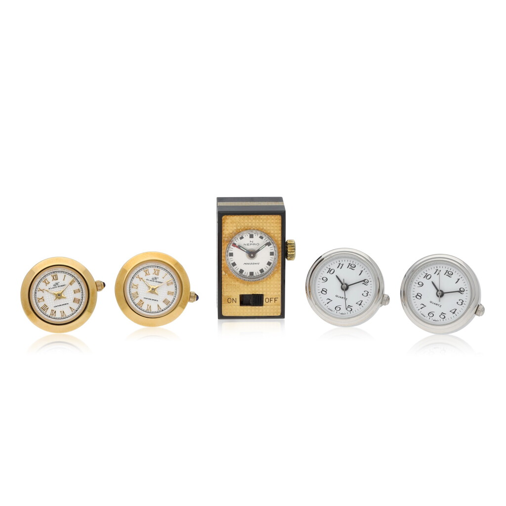 View full screen - View 1 of Lot 187. Two pairs of modern cufflink watches and a 1970s Nepro Minisonic alarm clock.