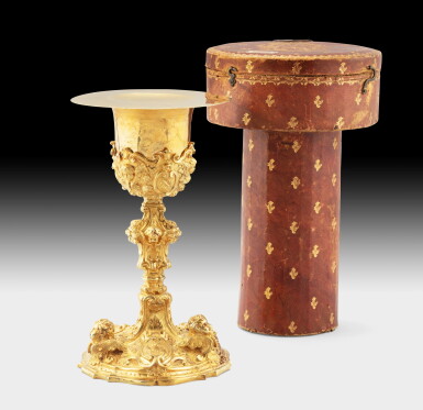 View full screen - View 1 of Lot 330. An Italian silver-gilt chalice and paten in fitted case with the coat-of-arms of the Paglicci family, Giuseppe Grazioli, Rome, 1778 | Calice en vermeil et sa patène dans son écrin aux armes de la famille Paglicci, par Grazioli, Rome, 1778.