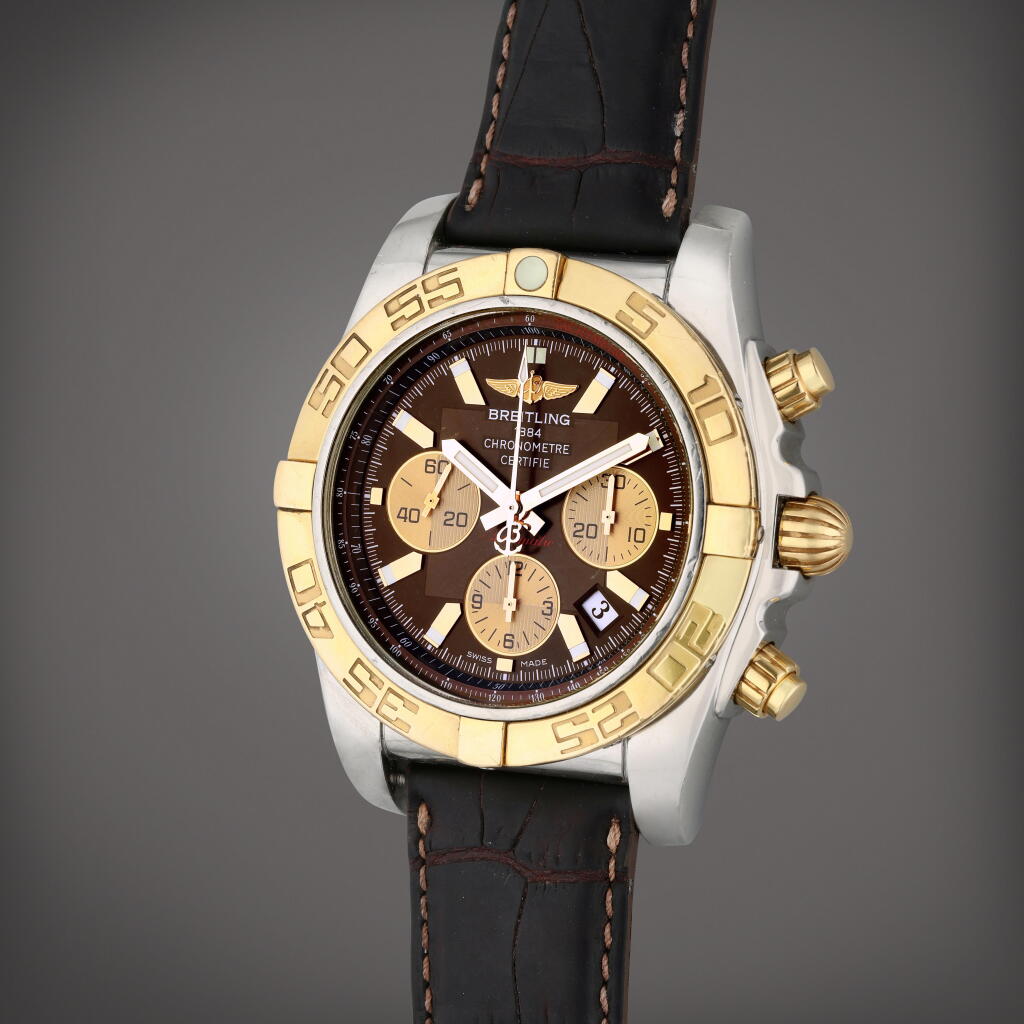 View full screen - View 1 of Lot 151. Reference CB011012/0576 Chronomat | A stainless steel and pink gold automatic chronograph wristwatch with date, Circa 2015.