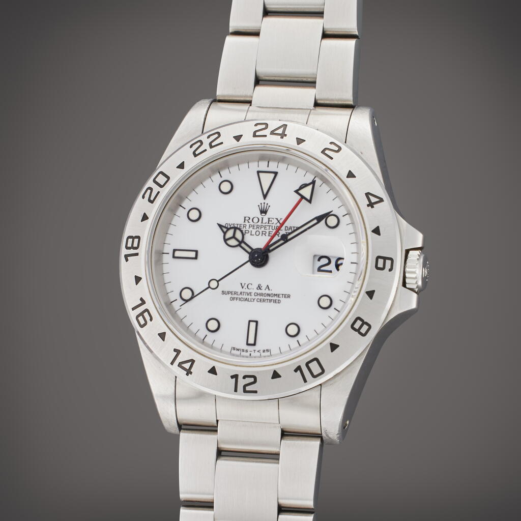 View full screen - View 1 of Lot 109. Reference 16570 Explorer II | Retailed by Van Cleef & Arpels: A stainless steel automatic dual time wristwatch with date and bracelet, Circa 1995.