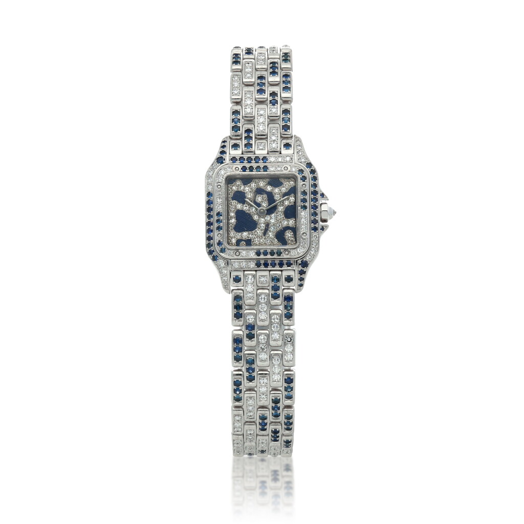 View full screen - View 1 of Lot 537. Panthère Ref. 8669 White gold, diamond and sapphire-set wristwatch Circa 1986.