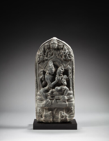View full screen - View 1 of Lot 88. A black stone stele depicting Uma Maheshvara, India, Pala period, 12th century | 印度 拉帕王朝十二世紀 黑石雕烏瑪–大自在天坐像.