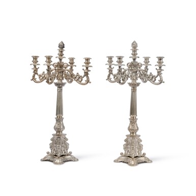 View full screen - View 1 of Lot 20. A set of four German silver candelabra | Gruppe von vier Kerzenleuchtern aus Silber, Deutschland.