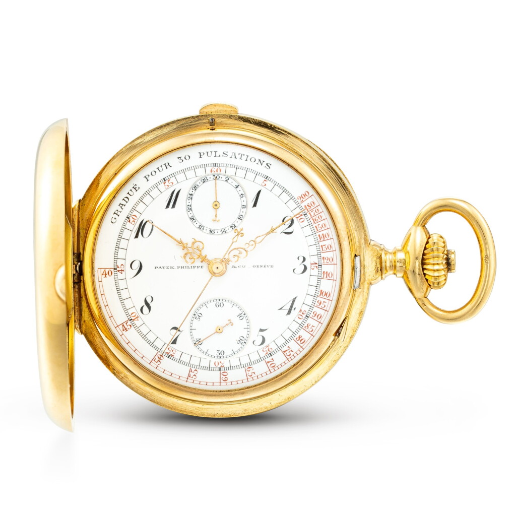 View full screen - View 1 of Lot 610. PATEK PHILIPPE | A YELLOW GOLD HUNTING CASE KEYLESS CHRONOGRAPH WATCH WITH ENAMEL DIAL, MADE IN 1912.
