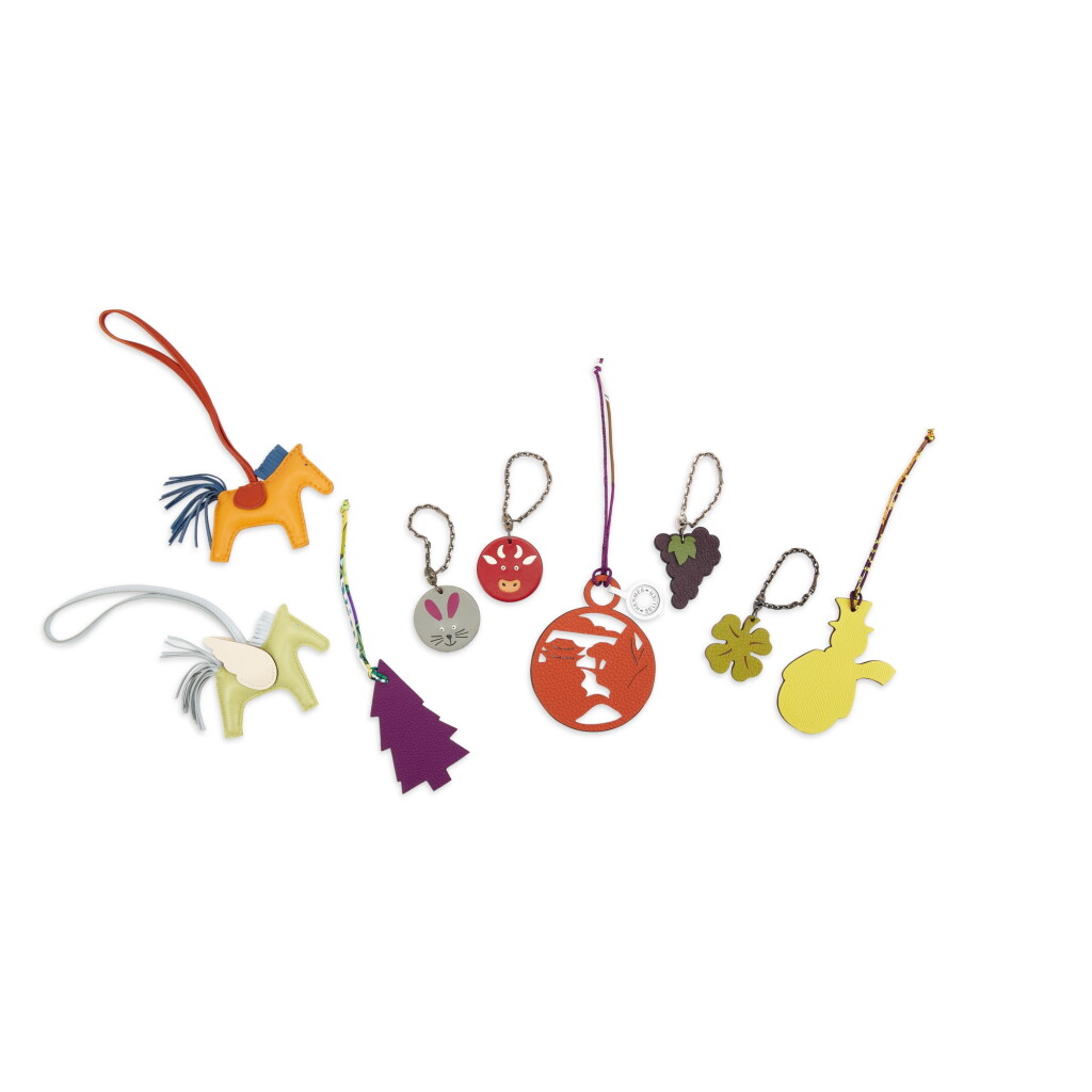 View full screen - View 1 of Lot 3161. Set of Nine Rodeo Pegase Charm, Rodeo Charm, Mouse Bag Charm, Lucky Clover Bag Charm, Grape Bag Charm, Cow Bag Charm and Three Petit H Charms.