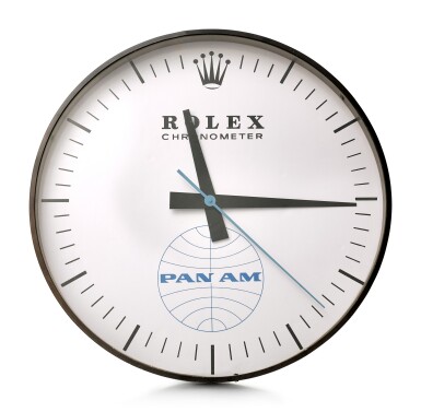 View full screen - View 1 of Lot 196. HANDOVER MANUFACTURE INC FOR ROLEX | REFERENCE G-062, A LARGE BLACKENED METAL WALL CLOCK, MADE FOR PAN-AM AMERICAN AIRWAYS, CIRCA 1965.