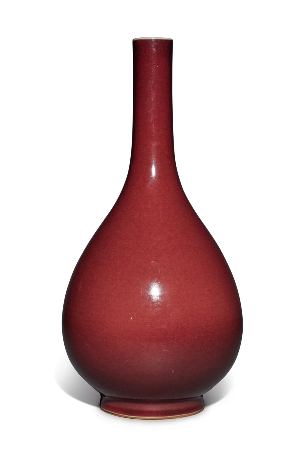 View full screen - View 1 of Lot 2. A copper-red-glazed bottle vase, Qing dynasty, 18th / 19th century | 清十八 / 十九世紀 紅釉長頸瓶.