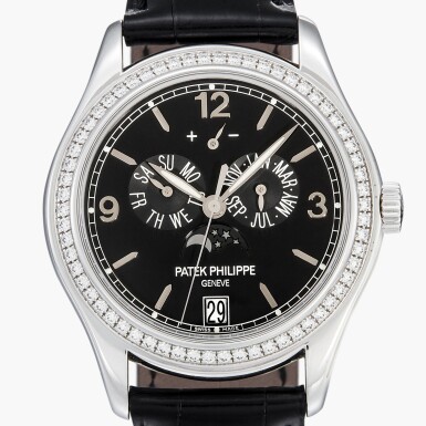 View full screen - View 1 of Lot 205. Reference 5147G-001 | A white gold and diamond-set annual calendar wristwatch with power reserve indication | Circa 2007.