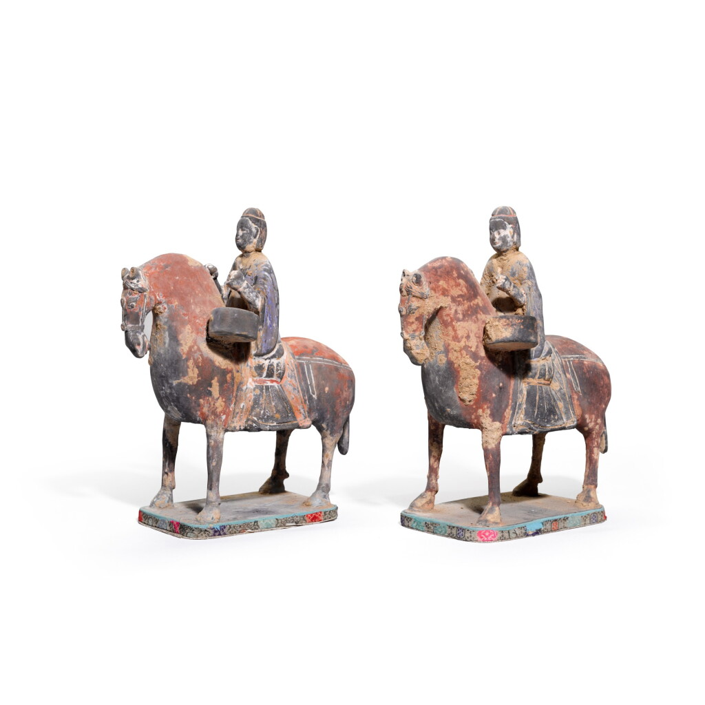 View full screen - View 1 of Lot 127. A pair of painted pottery equestrian figures, Northern Wei dynasty | 北魏 陶加彩騎馬俑一對.