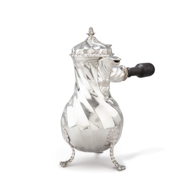 View full screen - View 1 of Lot 489. A large silver spirally fluted coffee-pot, Douai, probably 1752-1753 | Grande verseuse tripode à côtes torses en argent, Douai, probablement 1752 - 1753.
