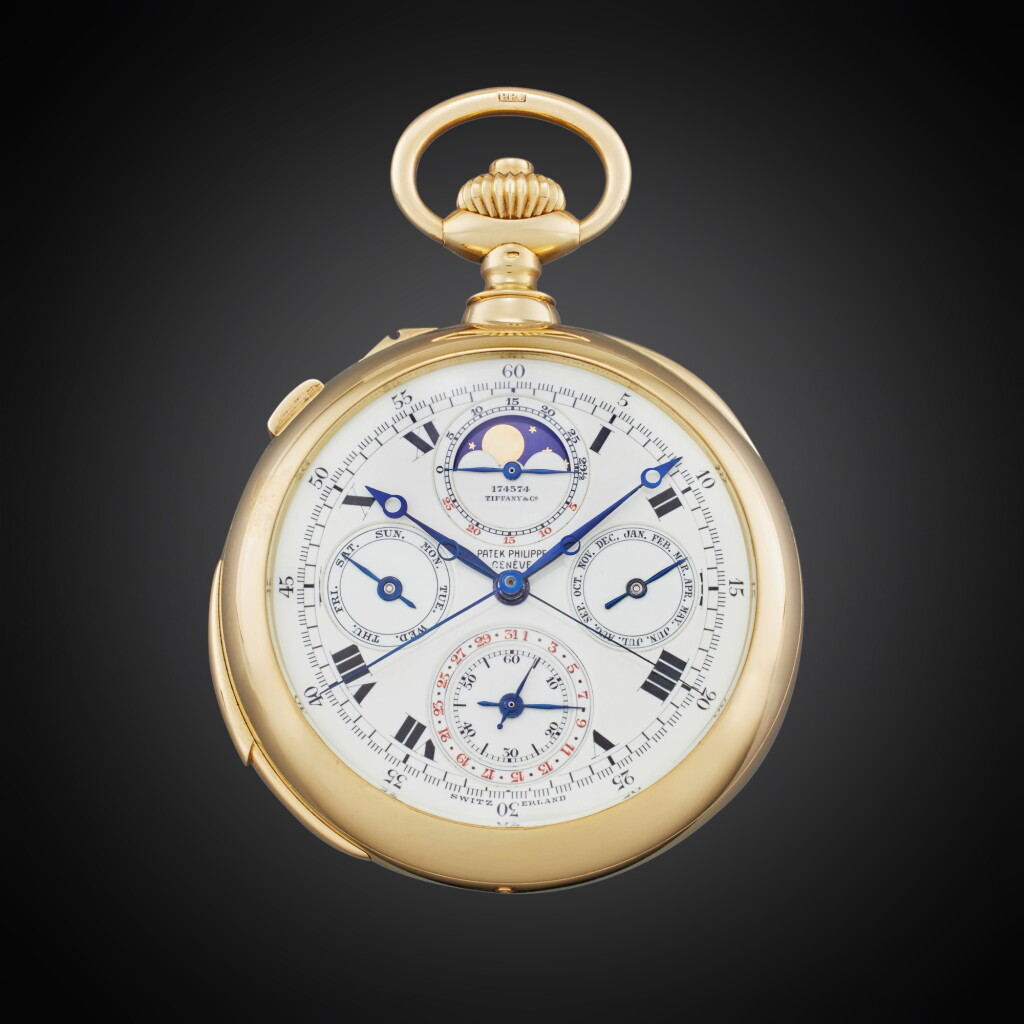 View full screen - View 1 of Lot 34. TBXII Grand Complication | Retailed by Tiffany & Co.: A yellow gold open faced minute repeating perpetual calendar split-seconds chronograph watch with moon phases, Made in 1917.