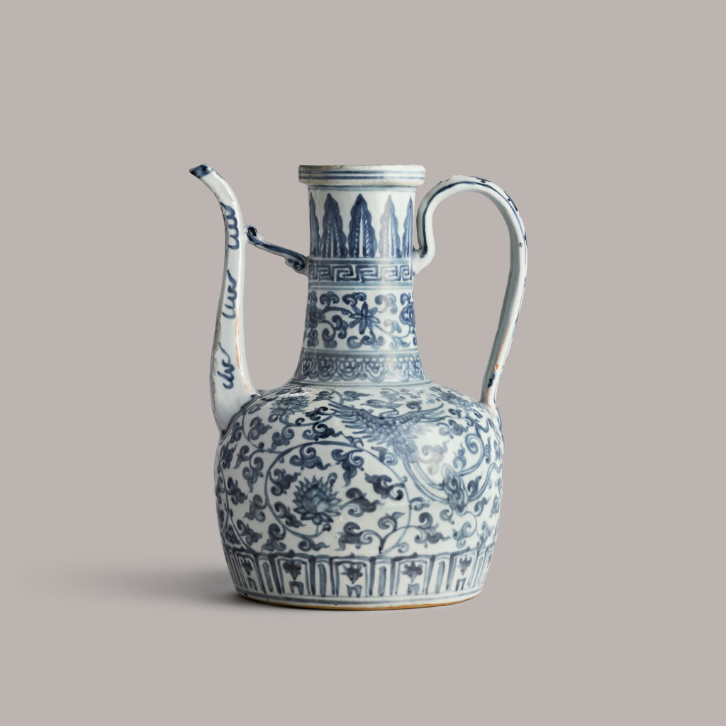 View full screen - View 1 of Lot 317. A blue and white 'phoenix' ewer Ming Dynasty | 明 青花鳳凰花卉紋執壺.