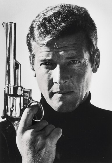View full screen - View 1 of Lot 240. TERRY O'NEILL | SIR ROGER MOORE AS JAMES BOND, 1973.