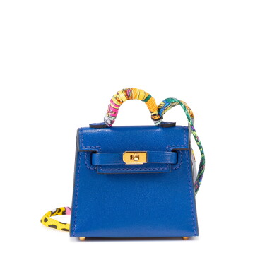 View full screen - View 1 of Lot 702. Bleu Saphir Tadelakt Micro Mini Kelly Twilly Bag Charm Gold Hardware, 2022.