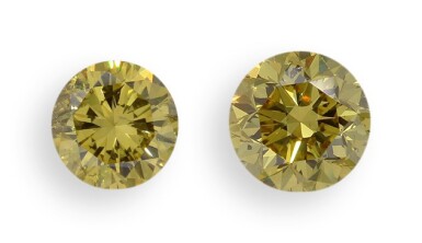 View full screen - View 1 of Lot 11. A Pair of Fancy Vivid Yellow Diamonds Each Weighing 1.01 Carats, SI2 Clarity.