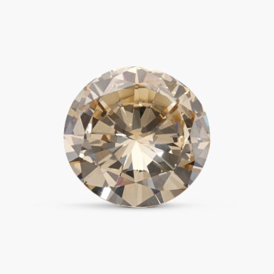 View full screen - View 1 of Lot 776. Unmounted Fancy Yellow-Brown Diamond weighing 10.12 carats.