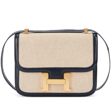 View full screen - View 1 of Lot 581. Vintage Bleu Marine Box and Ecru Toile Constance 23 Gold Hardware, 1980.