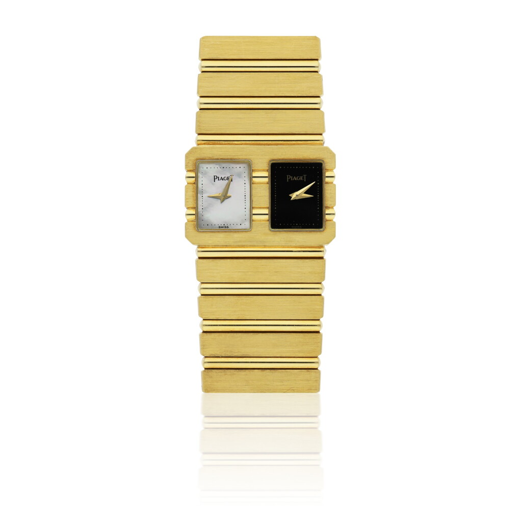 View full screen - View 1 of Lot 137. PIAGET | REF 15021 POLO DUAL TIME, A YELLOW GOLD DUAL TIME BRACELET WATCH CIRCA 1980.