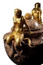 A gilt-bronze mounted Ural pink granite covered urn, Russia, Peterhof manufactory for the stone, workshop of St Petersburg for the mounts, circa 1805, from the Stroganoff collection | Grand vase couvert en granit rose de l’Oural et bronze doré, Russie, manufacture de Peterhof pour la pierre, ateliers de Saint-Petersbourg pour les bronzes, vers 1805, provenant des collections Stroganoff
