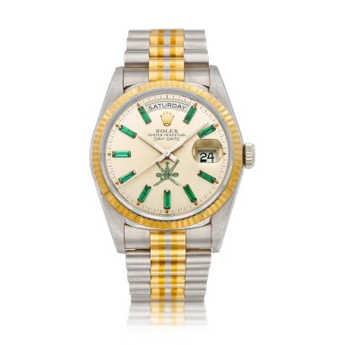 View full screen - View 1 of Lot 8208. Tridor Day-Date, Reference 18239 | A three colour gold and emerald-set wristwatch with day, date and bracelet, Circa 1991 | 勞力士 | Tridor Day-Date 型號18239 | 三色金鑲綠寶石鏈帶腕錶,備日期、星期顯示,約1991年製.