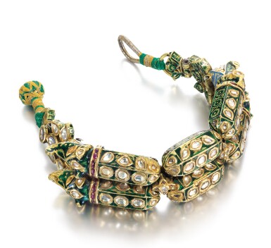 View full screen - View 1 of Lot 245. A MUGHAL GEM-SET AND ENAMELLED BRACELET WITH MAKARA-HEAD TERMINALS, NORTH INDIA, 18TH CENTURY.