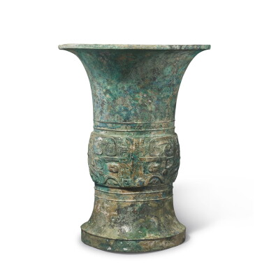View full screen - View 1 of Lot 240. An archaic bronze ritual wine vessel (Zun), Early Western Zhou dynasty | 西周初 青銅饕餮紋尊.