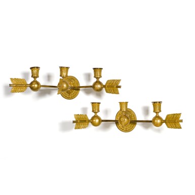 View full screen - View 1 of Lot 122. A pair of Empire style gilt-bronze three-light wall appliques, late 19th century.