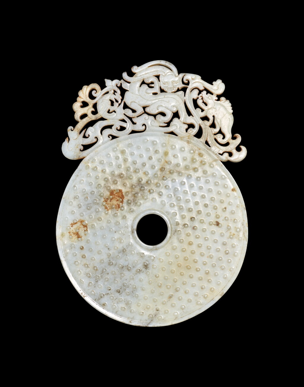 View full screen - View 1 of Lot 3809. An exceptionally rare and large white jade ‘chilong’ disc, bi, Eastern Han dynasty | 東漢 白玉鏤空出廓螭龍瑞獸紋璧.