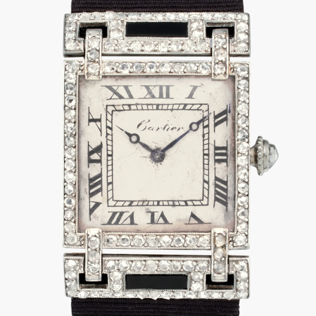 View full screen - View 1 of Lot 103. A rare Art Deco platinum and yellow gold diamond-set wristwatch, Circa 1920.