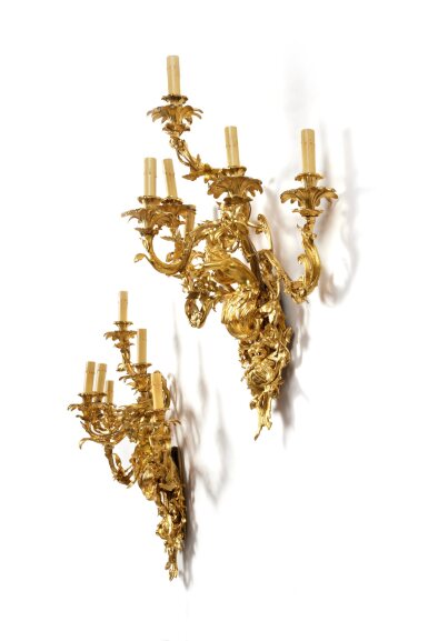 View full screen - View 1 of Lot 79. A Pair of Gilt Bronze Six-Light Wall Lights in the Manner of Francesco Ladatte 19th Century.