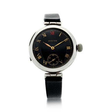 View full screen - View 1 of Lot 52. A STERLING SILVER WRISTWATCH TRANSFORMED FROM A POCKET WATCH, CIRCA 1934.