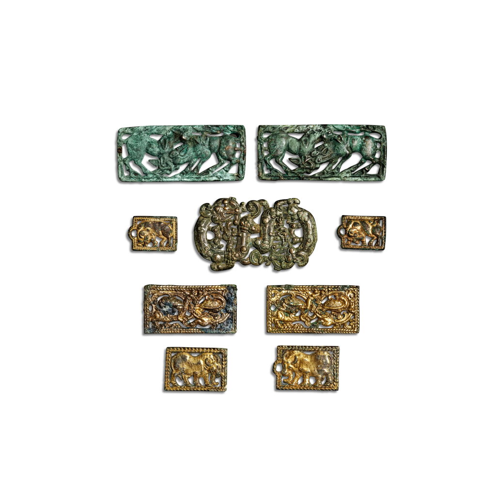 View full screen - View 1 of Lot 105. A group of eight bronze plaques, Northern China, Han dynasty.