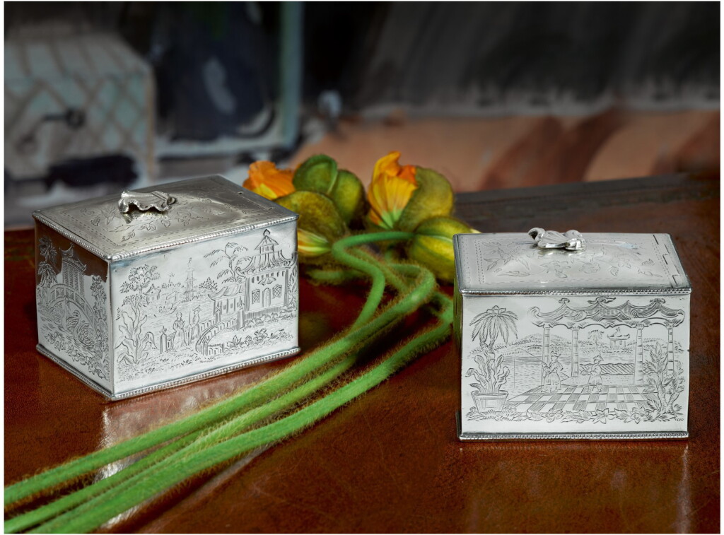 View full screen - View 1 of Lot 38. A PAIR OF GEORGE III SILVER RECTANGULAR TEA CADDIES, SAMUEL WHITFORD, LONDON, 1778.