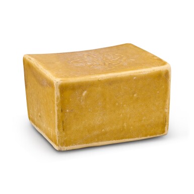 View full screen - View 1 of Lot 434. A Shouzhou straw-glazed papercut pillow Tang dynasty | 唐 壽州窰米黃釉剪紙貼花枕.