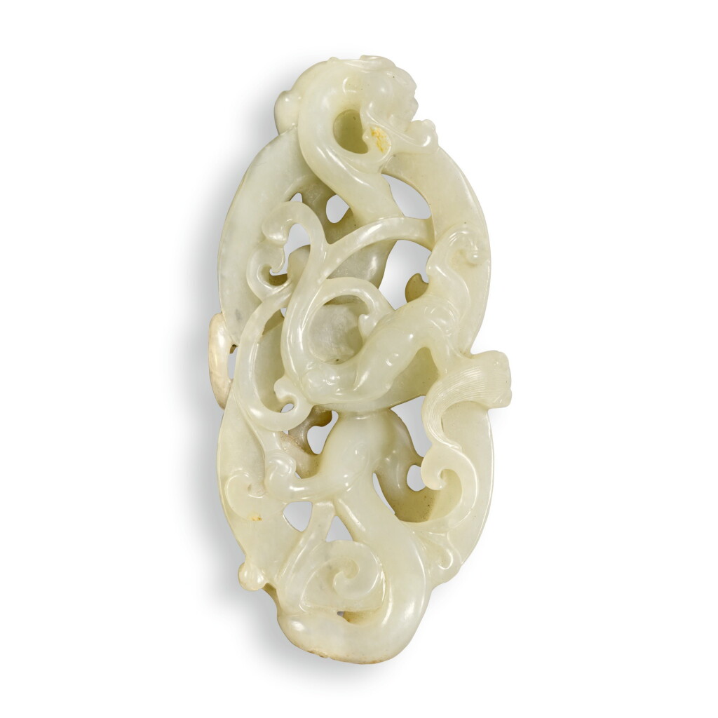 View full screen - View 1 of Lot 174. A PALE CELADON JADE 'CHILONG' CARVING, QING DYNASTY, 18TH CENTURY | 清十八世紀 青白玉鏤雕螭龍紋牌飾.