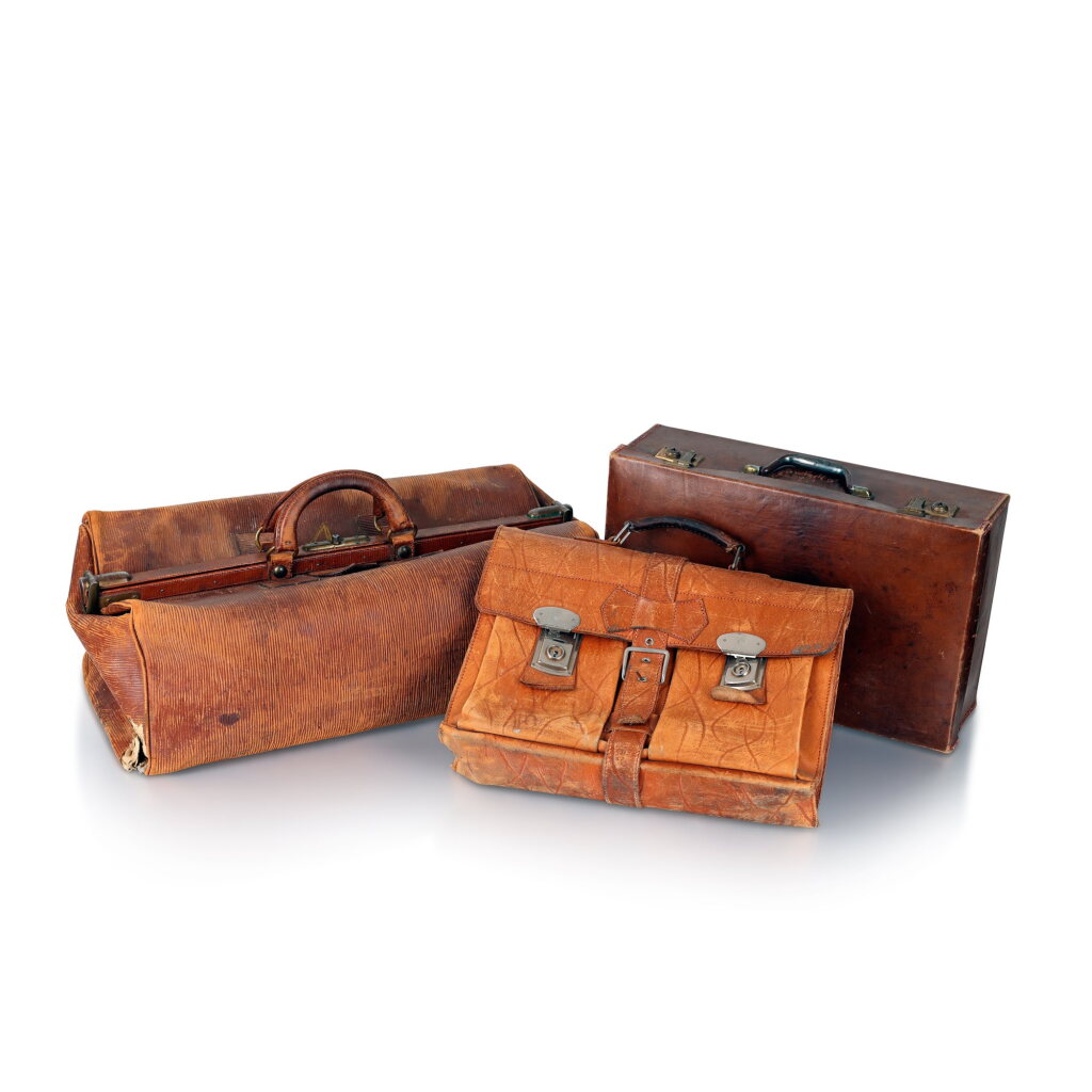 View full screen - View 1 of Lot 1130. Group of three leather bags and four fabric pouches.