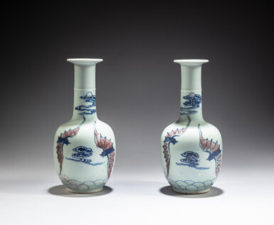 View full screen - View 1 of Lot 120. A pair of blue and white and underglaze-red 'bat' bottle vases, China for the Vietnamese court, 19th / 20th century | 中國外銷安南 十九 / 二十世紀 青花釉裡紅雲蝠紋長頸瓶一對.