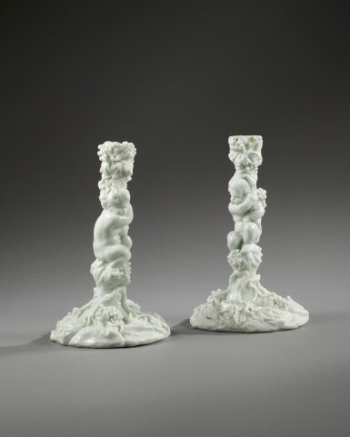 View full screen - View 1 of Lot 337. A pair of Capodimonte or Buen Retiro white porcelain candlesticks, circa 1750-60.