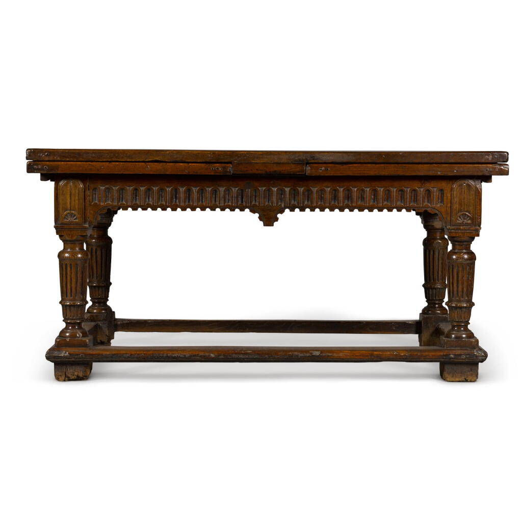 View full screen - View 1 of Lot 26. An Anglo-Dutch 'Antiquarian' oak draw-leaf table, in the manner of Vredeman de Vries, 19th century.