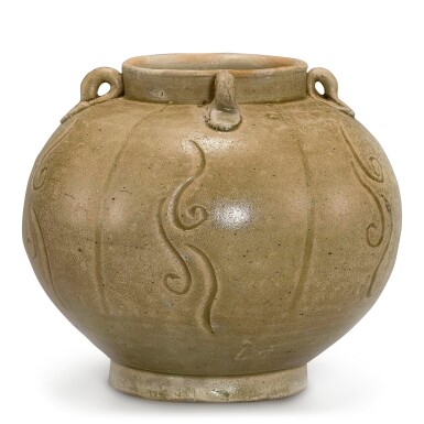 View full screen - View 1 of Lot 331. A YUE CELADON CARVED LOBED JAR FIVE DYNASTIES | 五代 越窰青釉瓜棱式四繫罐.