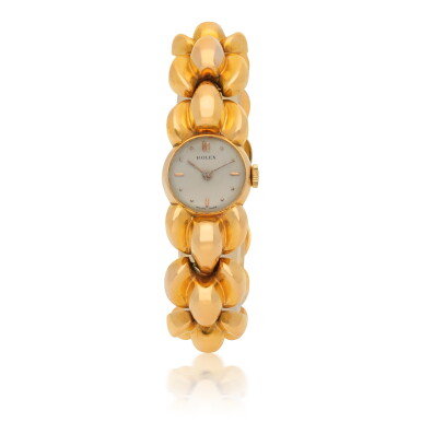 View full screen - View 1 of Lot 62. ROLEX | YELLOW GOLD BRACELET WATCH, CIRCA 1946.