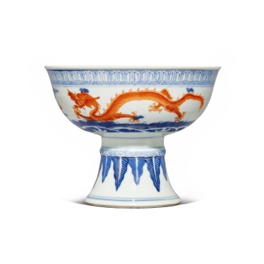 View full screen - View 1 of Lot 26. An iron-red and underglaze-blue 'dragon' stemcup, Qing dynasty, 19th century.