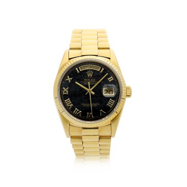 View full screen - View 1 of Lot 30. Reference 18038 Day-Date A yellow gold automatic wristwatch with day, date, ferrite hardstone dial and bracelet, Circa 1986.
