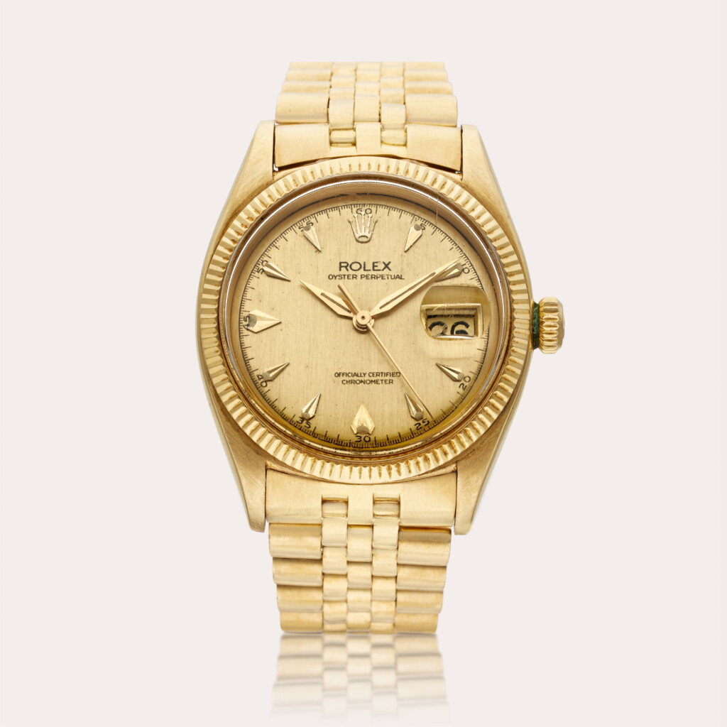 View full screen - View 1 of Lot 621. Reference 6605 Oyster Perpetual | A yellow gold automatic wristwatch with date and bracelet, Circa 1959.