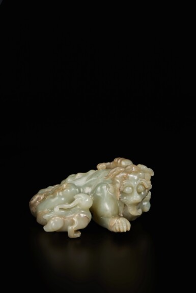 View full screen - View 1 of Lot 222. A large and rare pale green and russet jade 'qilin and cub' group', Qing dynasty, Qianlong period.