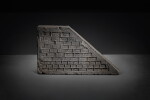 A group of two impressed trapezoidal gray pottery 'rider and chariot' tomb tiles, Western Han dynasty